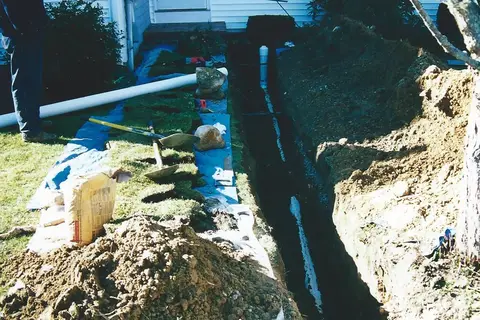 Excavated trench during a line location job