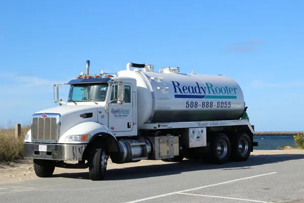 Ready Rooter septic pumping truck at the Cape Cod shore