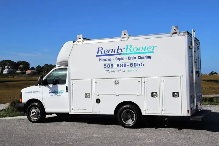 Ready Rooter service van parked by a Cape Cod marsh