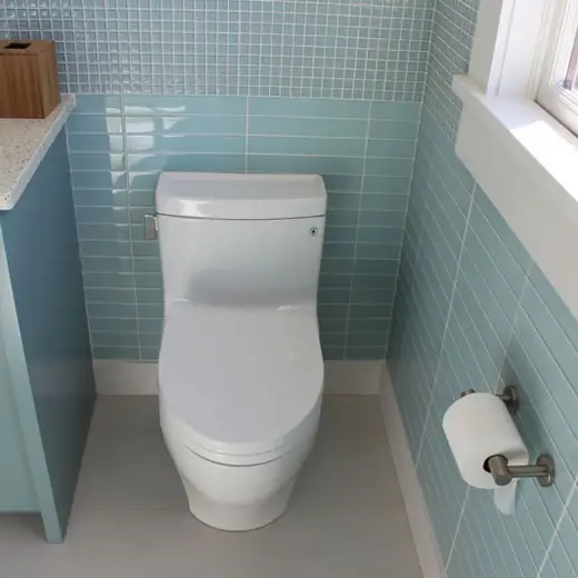 Laundry room with stacked washer and dryer