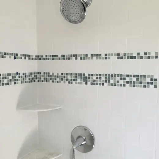 Tiled shower with new fixtures