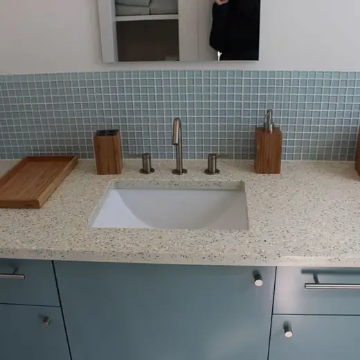 Bathroom vanity with blue tile